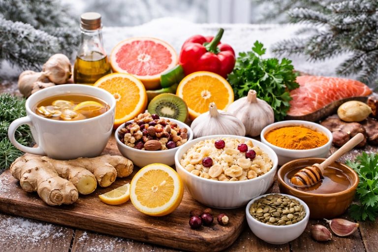 Zimowa dieta wspierająca odporność, zdrowe produkty spożywcze na stole, warzywa, owoce, herbata z imbirem i naturalne składniki w zimowej scenerii